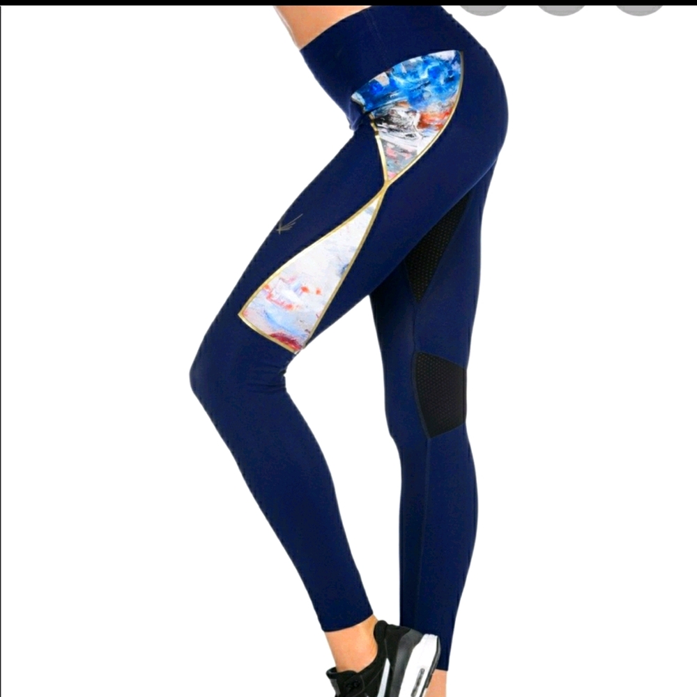 Midnight blue leggings with mesh panels. Zippered